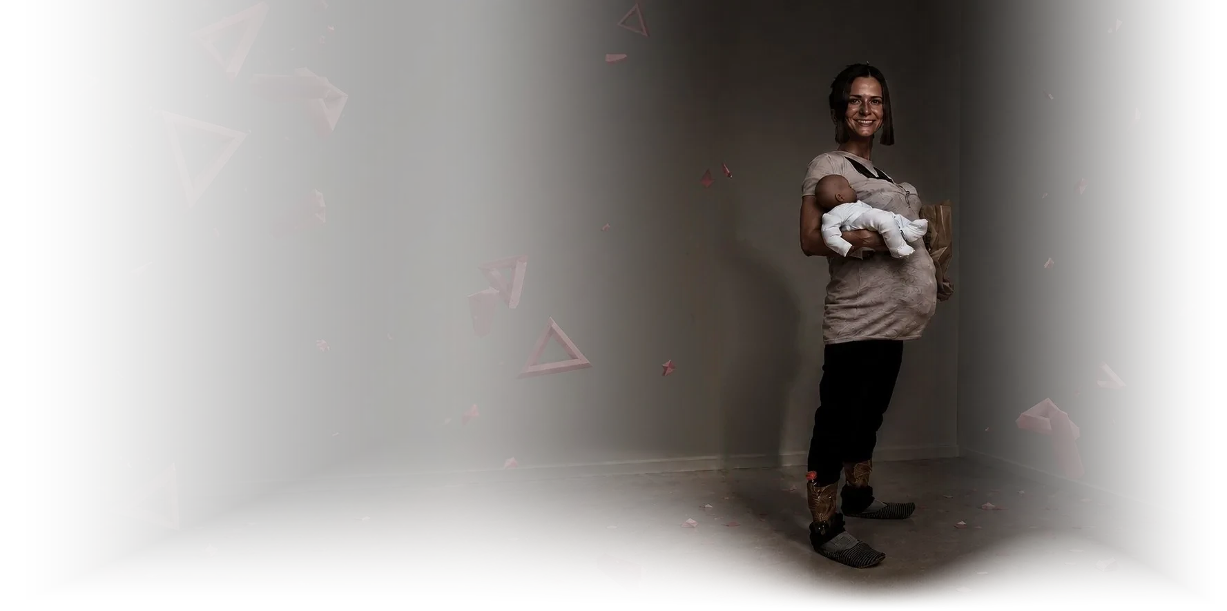 Collage self-portrait: Chi standing in a dimly lit studio scattered with pink paper confetti