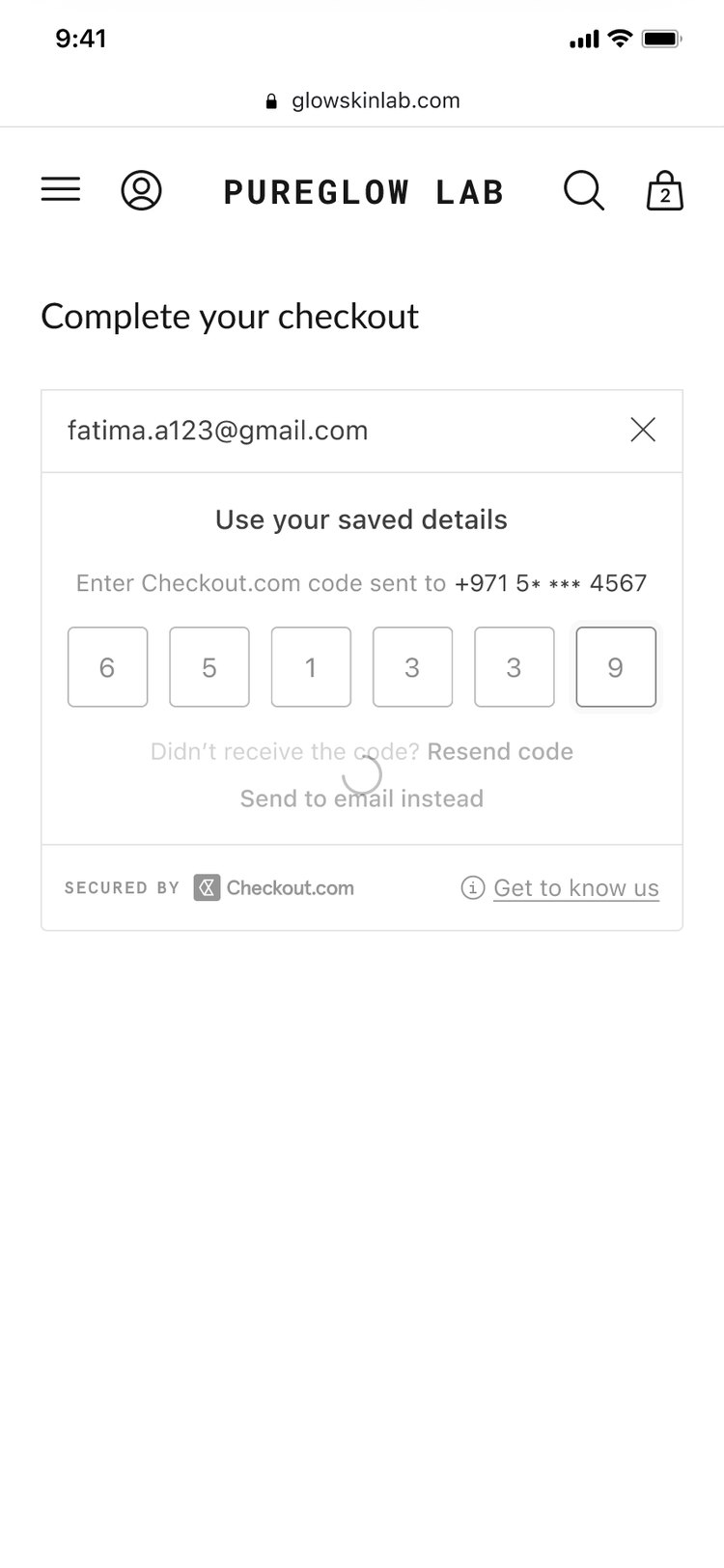 The one-time code screen with a six-digit verification code filled in, sent to the shopper's saved phone number